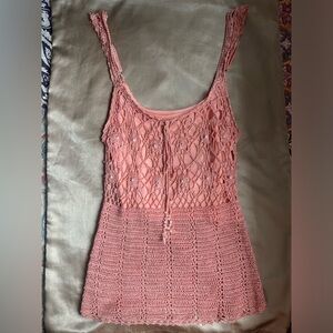 Unique and adorable peachy pink crochet top with pearl accents
